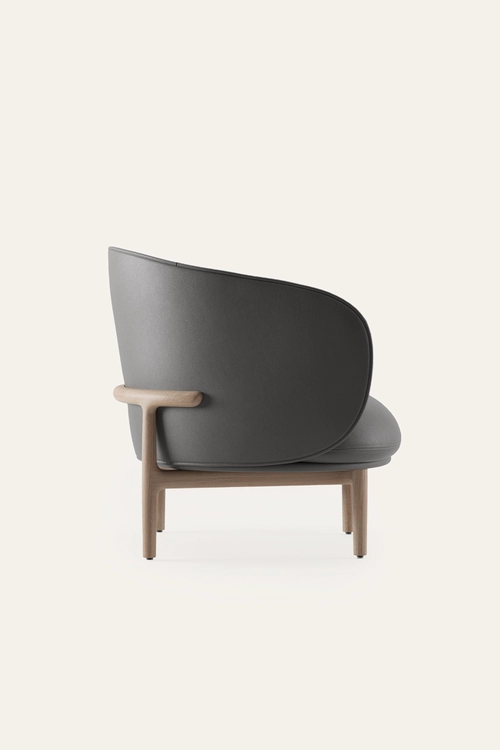 Křeslo Mela Lounge designové čalouněné křeslo z masivního dřeva